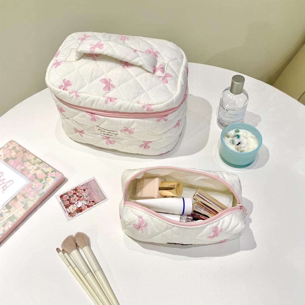 Picture of Simple bow travel portable cosmetic bag large capacity high-end feeling ins high-value cosmetic bag a batch
