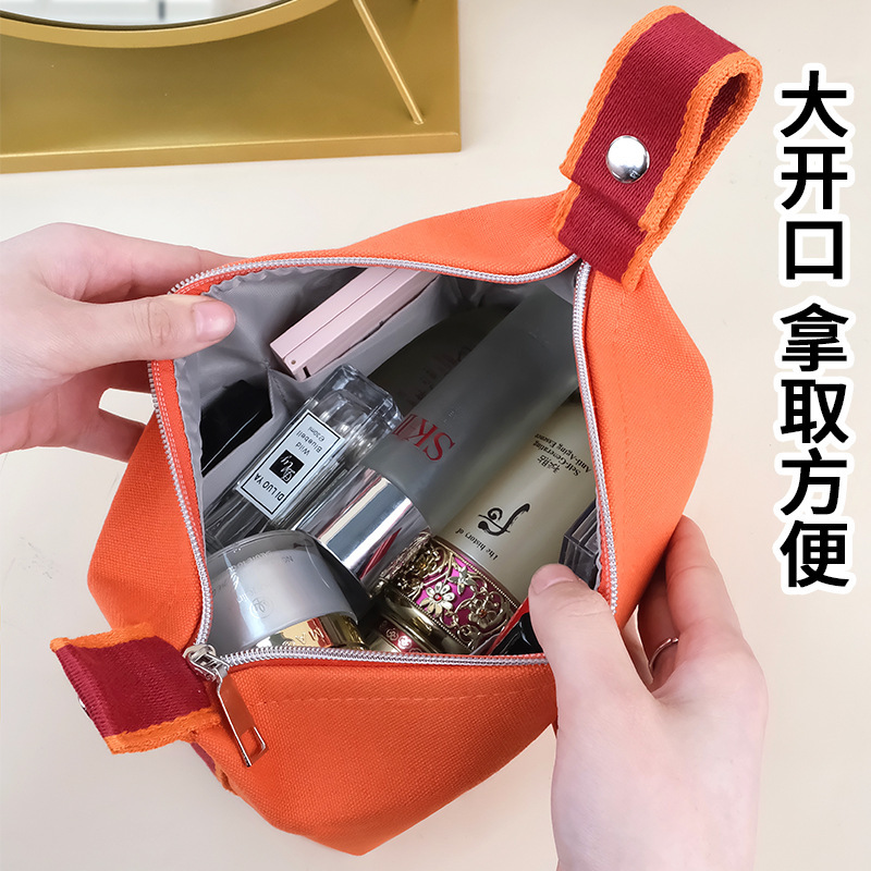 Picture of New ins canvas portable cosmetic bag large capacity wash bag women portable travel storage bag manufacturers wholesale