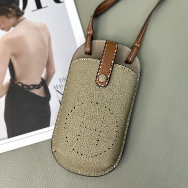 Picture of Cowhide Hollow Mobile Phone Bag for Women 2024 New Fashion Super Hot Shoulder Crossbody Bag Niche Design Western Style Large Capacity