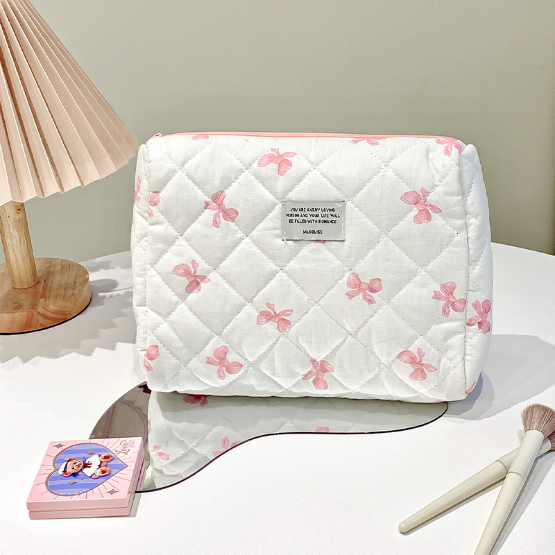 Picture of Simple bow travel portable cosmetic bag large capacity high-end feeling ins high-value cosmetic bag a batch