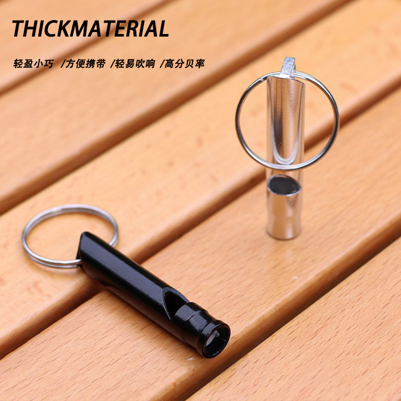 Picture of Outdoor aluminum alloy survival whistle wholesale portable key chain referee whistle high frequency emergency fire training survival whistle