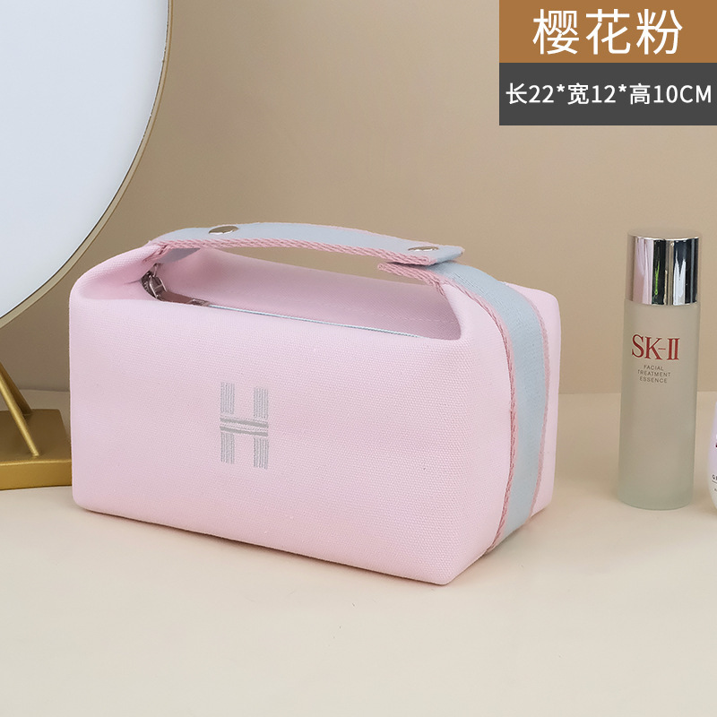 Picture of New ins canvas portable cosmetic bag large capacity wash bag women portable travel storage bag manufacturers wholesale