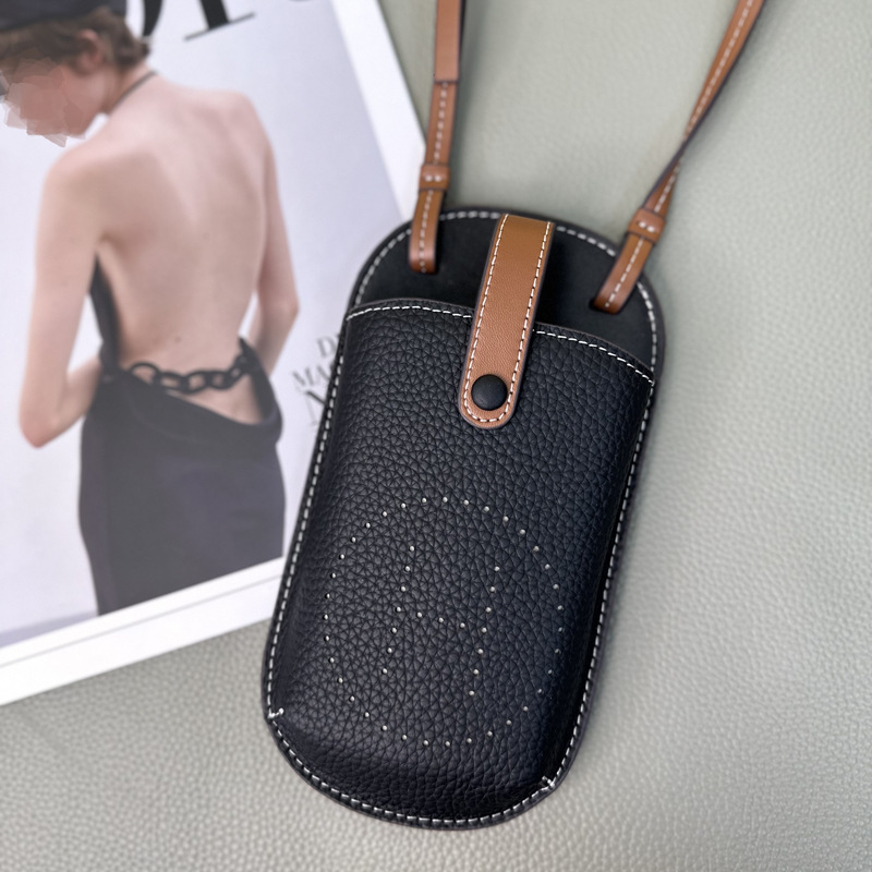 Picture of Cowhide Hollow Mobile Phone Bag for Women 2024 New Fashion Super Hot Shoulder Crossbody Bag Niche Design Western Style Large Capacity