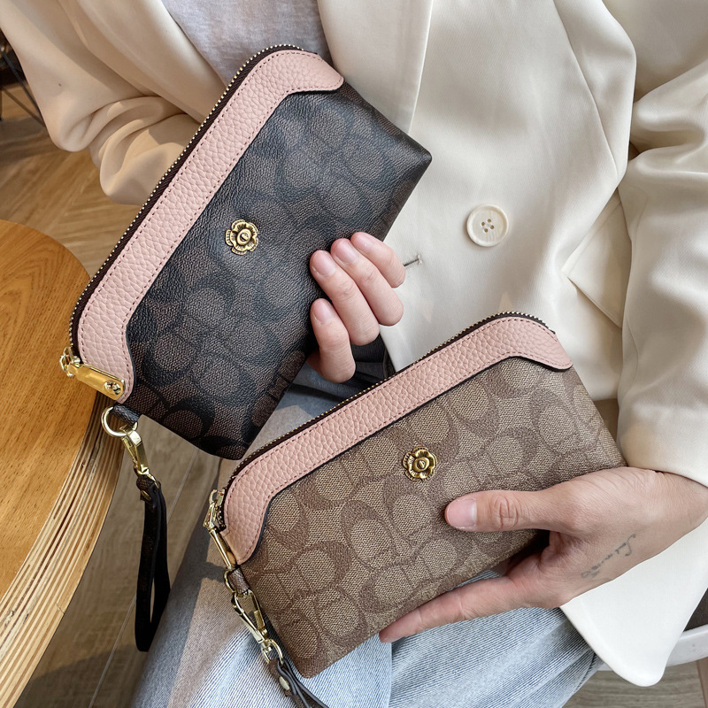 Picture of 2025 New Handbags Women's Small Bags Fashionable Shoulder Crossbody Bags Trendy Wallets Women's Long Mobile Phone Bags Mom's Style