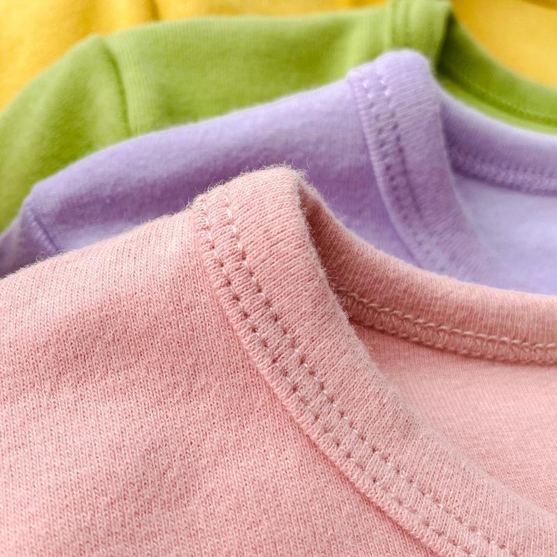 Picture of 2023 Children's Cotton Long-sleeved T-shirt Base Shirt Spring and Autumn Loose Solid Color Round Neck Sanding Top for Boys and Girls