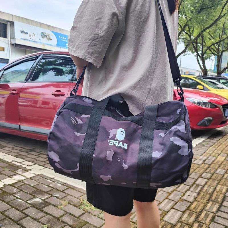 Color packaging gradient ape camouflage waterproof cylinder diagonal bag travel portable storage bag sports bag B4815
